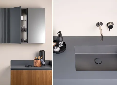 Stocco Badmöbel mit Kombination aus geriffeltem Hängeschrank, Holzfront und dunklem Waschbecken im minimalistischen Design.